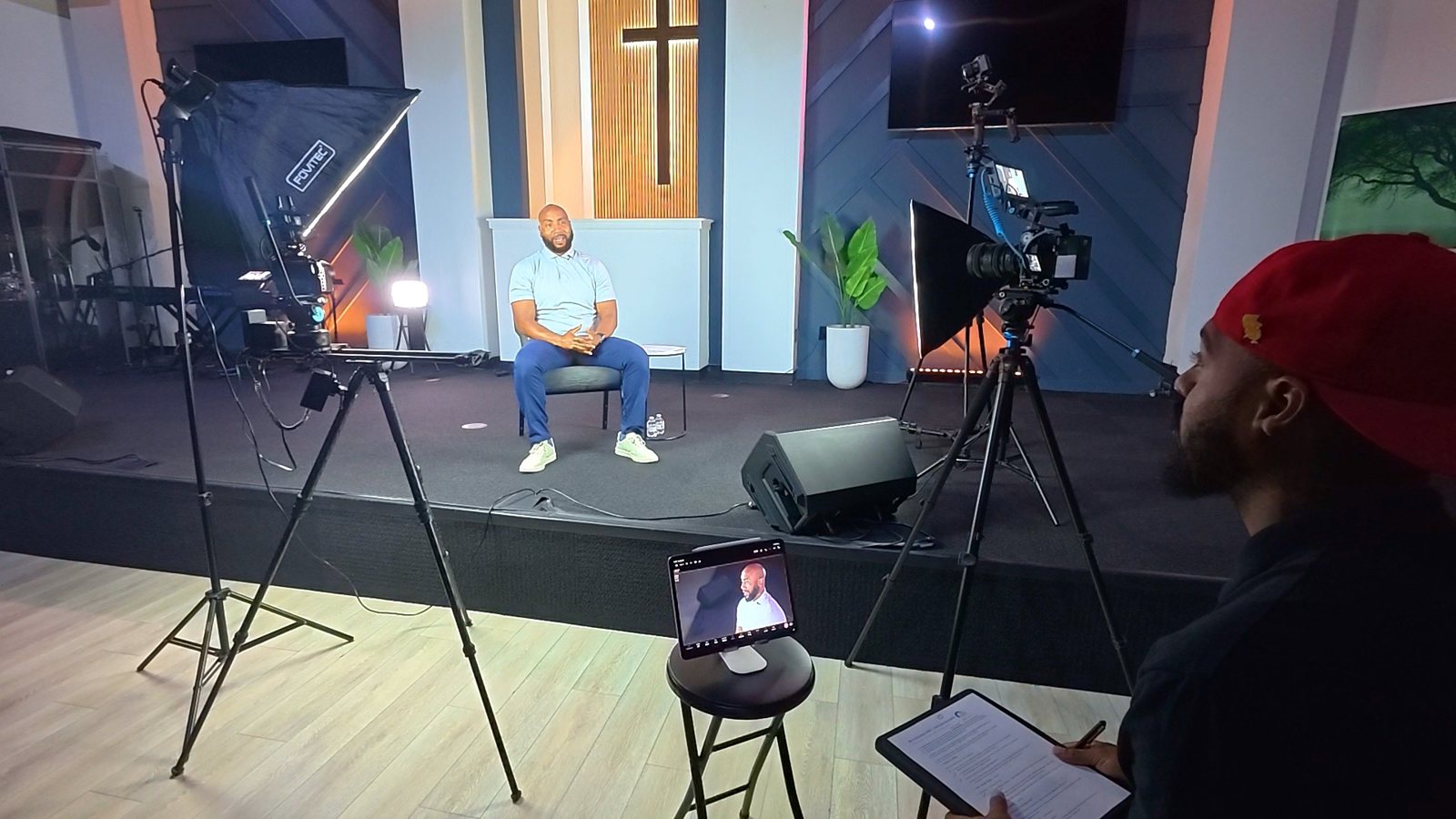 Nick directing a two-camera, softbox-lit interview on the Image Church stage