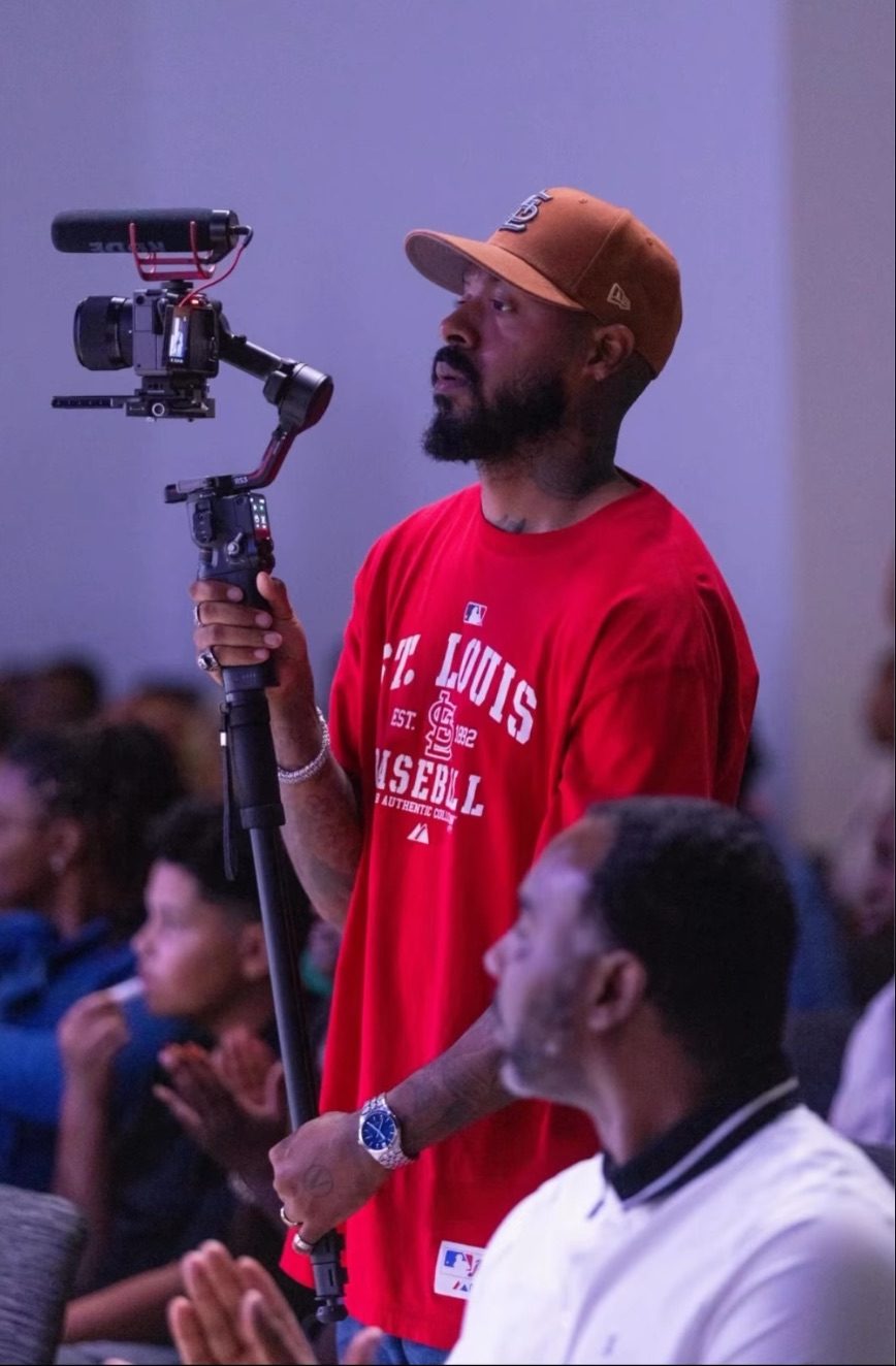 Nick operating a gimbal at a live event